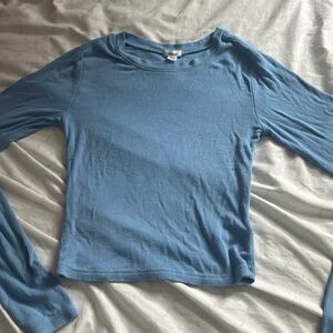 It’s a Garage long sleeve in blue a Xs only worn twice good condition